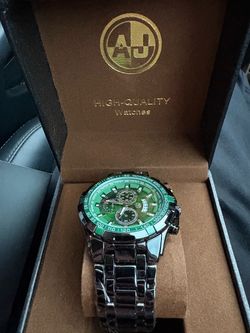 Watch green and black