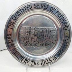 COLECTIBLE PEWTARES METAL PLATE WILTON COLUMBIA THE CLUSTERED SPIRES OF FREDERICK GREEN  WALLED BY THE HILLS OF MARILAND