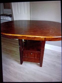 BROWN ROUND TABLE/WARDROBES