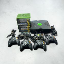 Original xbox with controllers and games