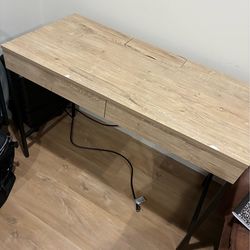 Desk with outlet
