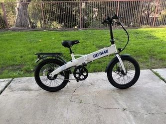 Gotrax Z4 Lite E-Bike with Charger, Two Keys, and Low Miles