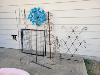 All $15. Trellises, tomato cages and a wind spinner for garden