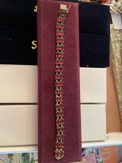 14k gold bracelet with garnets
