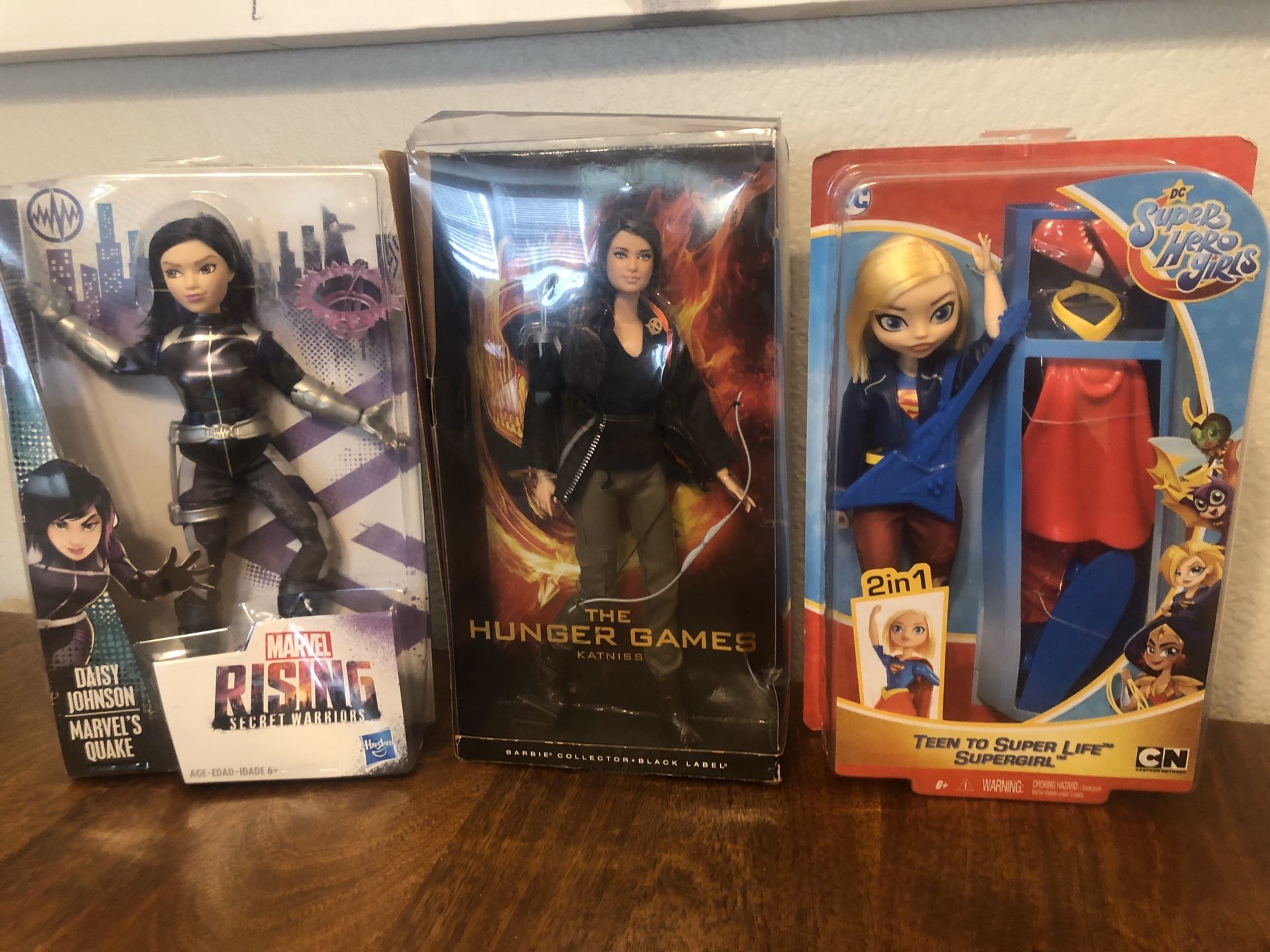 Dolls supera hero’s . Girls Rule Hunger Games , Barbie . Super girl marvel collectible