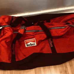 Vintage Marlboro Unlimited EXTRA LARGE Red Black Rolling Duffle Bag Wheels And Strap