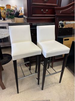 Pair of white bar stools