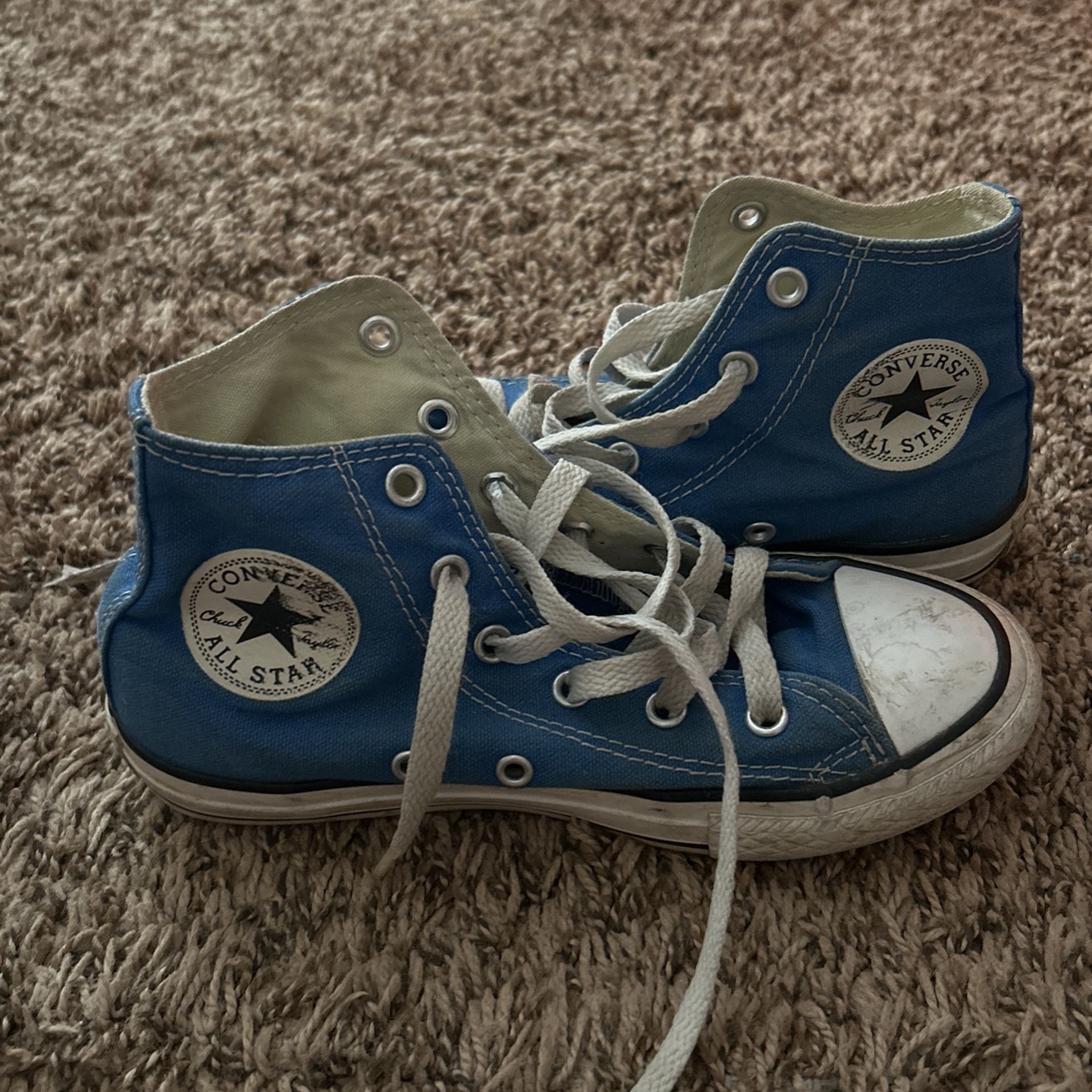 blue high-top converse