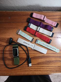 FitBit Charge 5 (with charging cord and 7 wristband options)