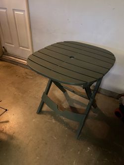 Plastic folding table