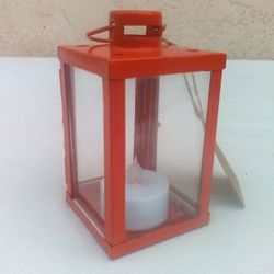 Small Orange Metal Decorative Lantern (2.5"L x 2.25"W x 4.25"H) with Flickering Candle Light