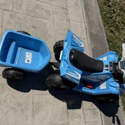 blue kids ride on motorcycle with trailer