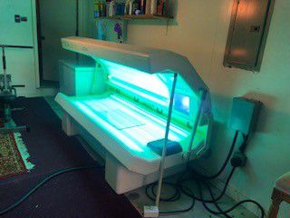 Ultra Sun commercial tanning bed with facial lamps