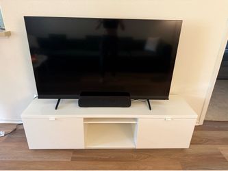 Hisense Tv with stand and sound bar included