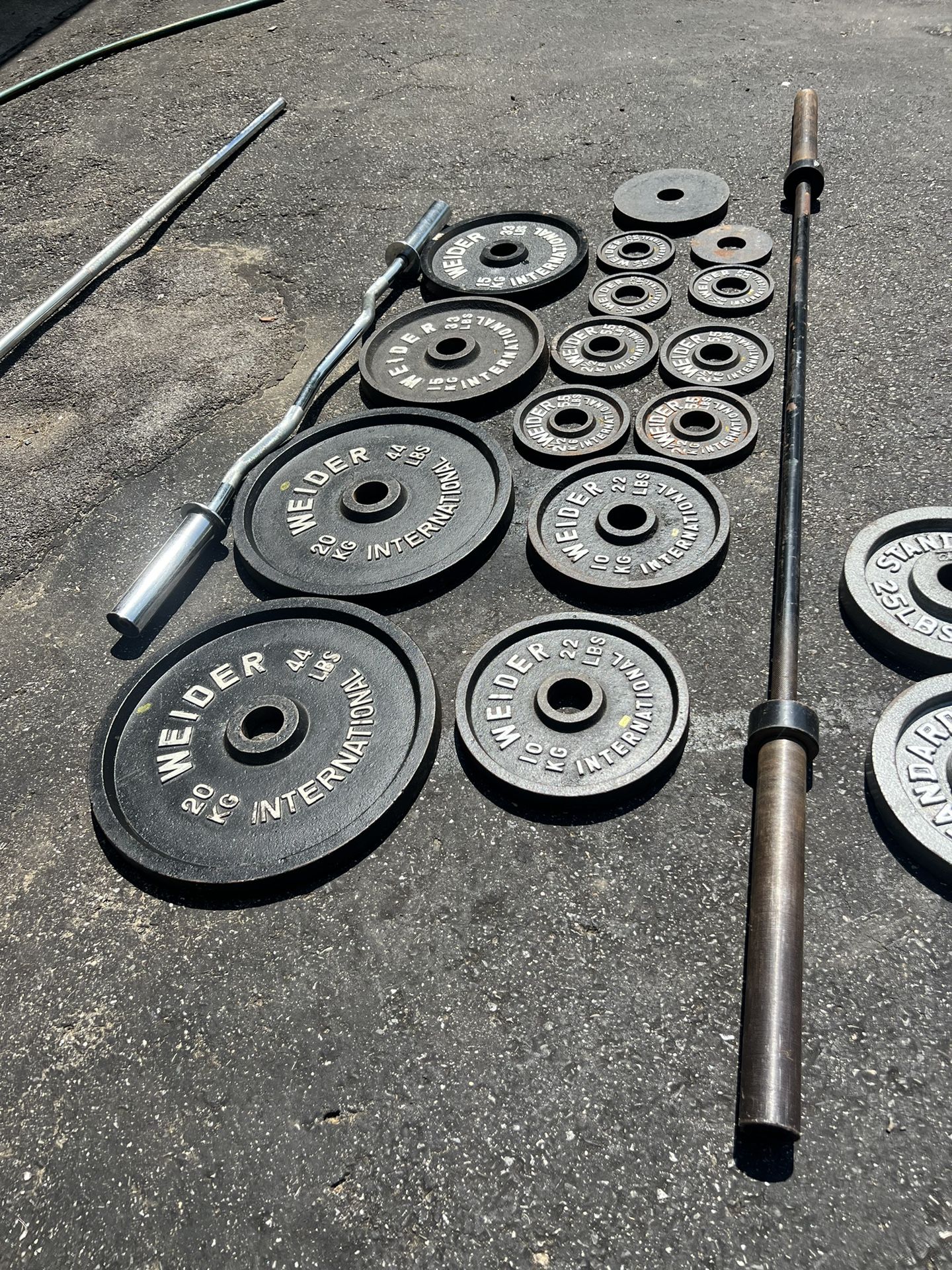 Olympic weight set with barbell and curl bar