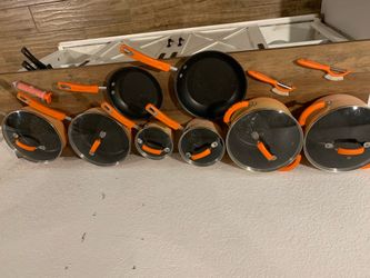 14 Piece Rachel Ray Cookware Set with Lids. Good Condition. Faded Orange. Rubber Handles. Asking 60.00 Richland Hills 76118