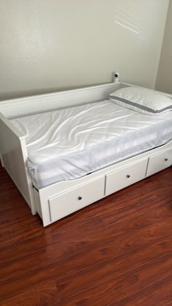 Twin bed with pull out bed and storage
