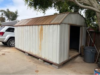 Free Metal shed and treated wood floor