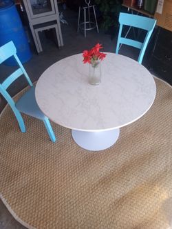 Table and 2 chairs with rug . ALL BRAND NEW