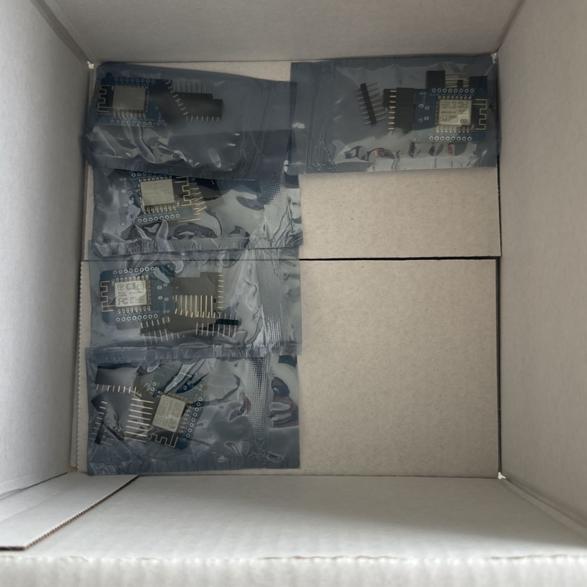 A box of 5 wifi-micro chips