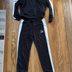 New women puma jump suit size medium