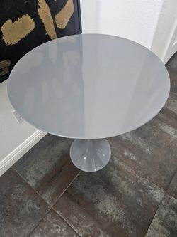 Gray Pedestal Round Table