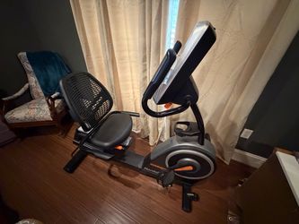 NORDIC TRACK RECUMBENT BIKE IN NEED OF REPAIR.