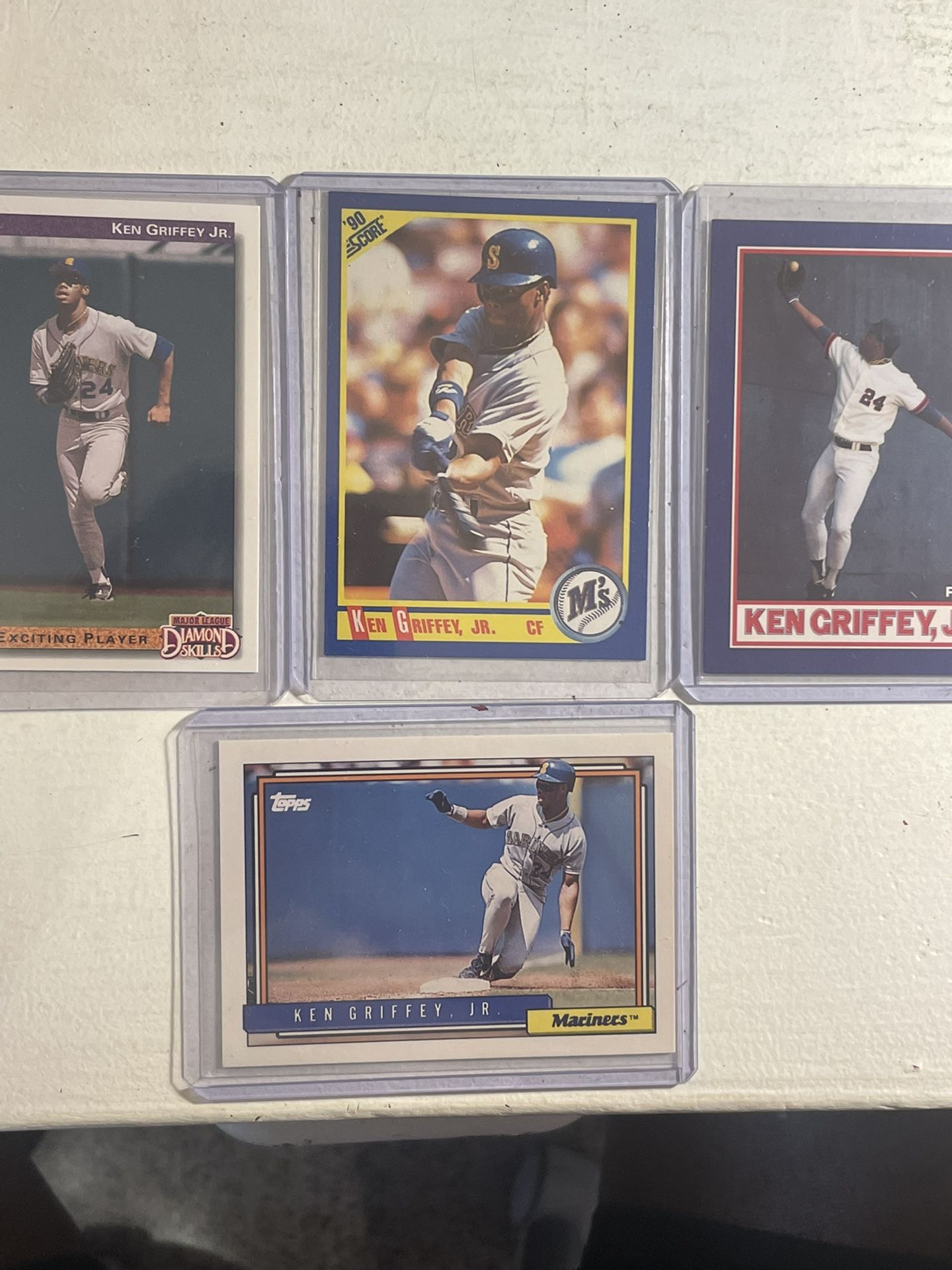 Four (4) Ken Griffey Jr Baseball Cards, all in excellent condition 