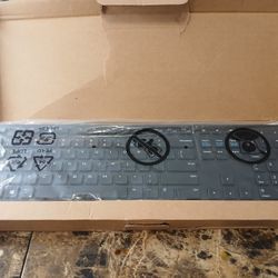 This is the Dell KB216 USB Keyboard in Black. It is a slim keyboard made of plastic with a QWERTY (Standard) layout. It has a wired connectivity via U
