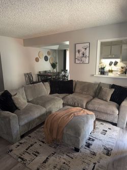 Grey L shape sectional couch