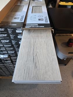 Stain Master London Sky Oak 12-mil x 7-in W x 48-in L Waterproof Luxury Vinyl Plank Flooring