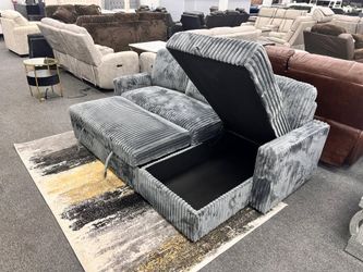 Brand New Sectional w/Sofa bed features plush corduroy fabric