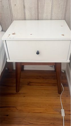 White bedside table slightly damaged