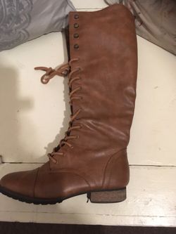 Brown lace up knee high boots