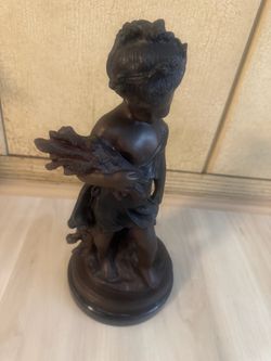 Dark Bronze-Tone Cherub Figurine with Foliage
