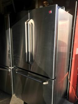 refrigerator brand GE measures 35 wide and 70 high 3 months warranty delivery and installation