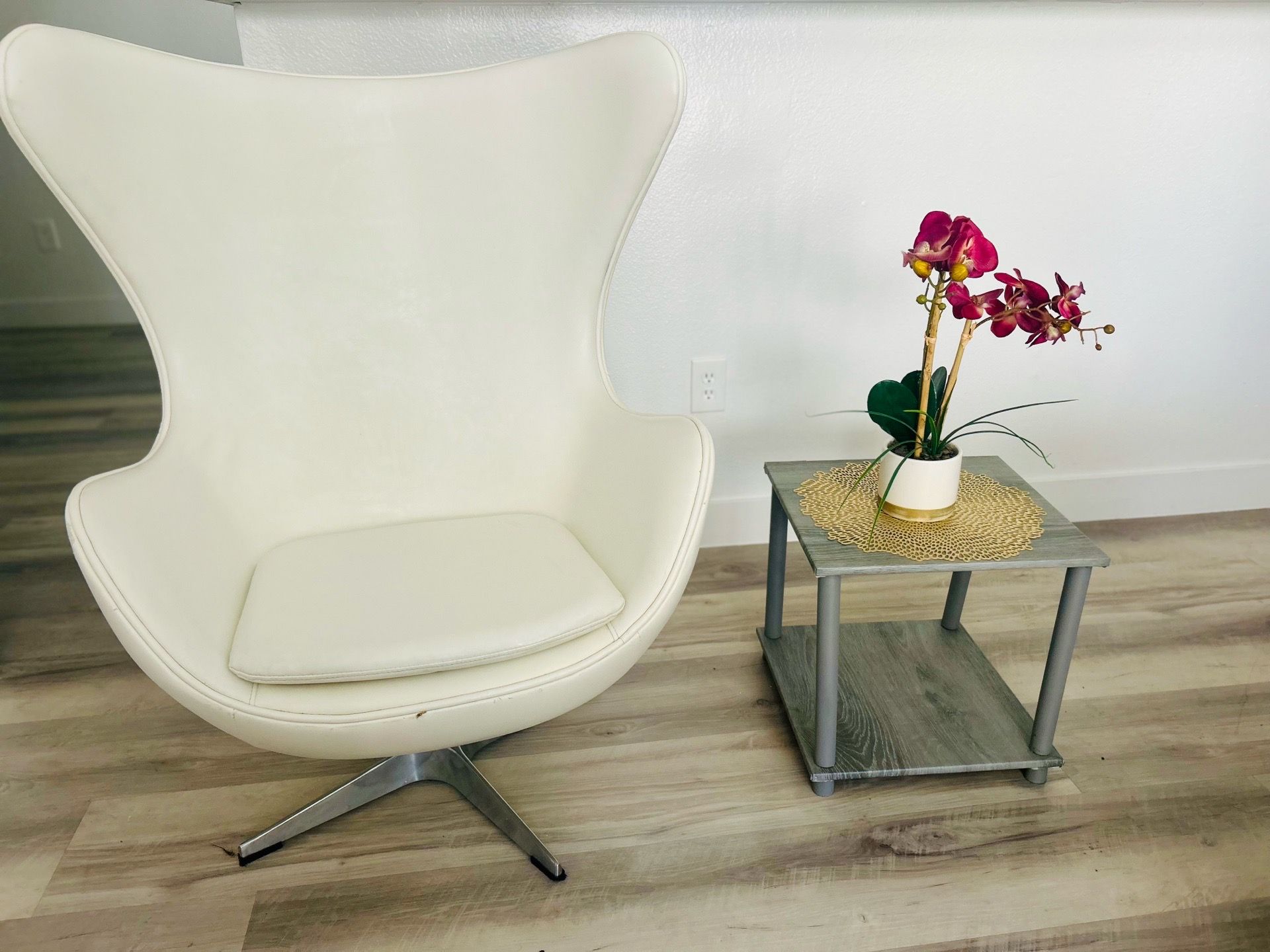 White leather egg accent chair recliner