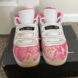 White and pink store snakeskin 11s