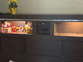 Piece of bed frame with built in speakers and light