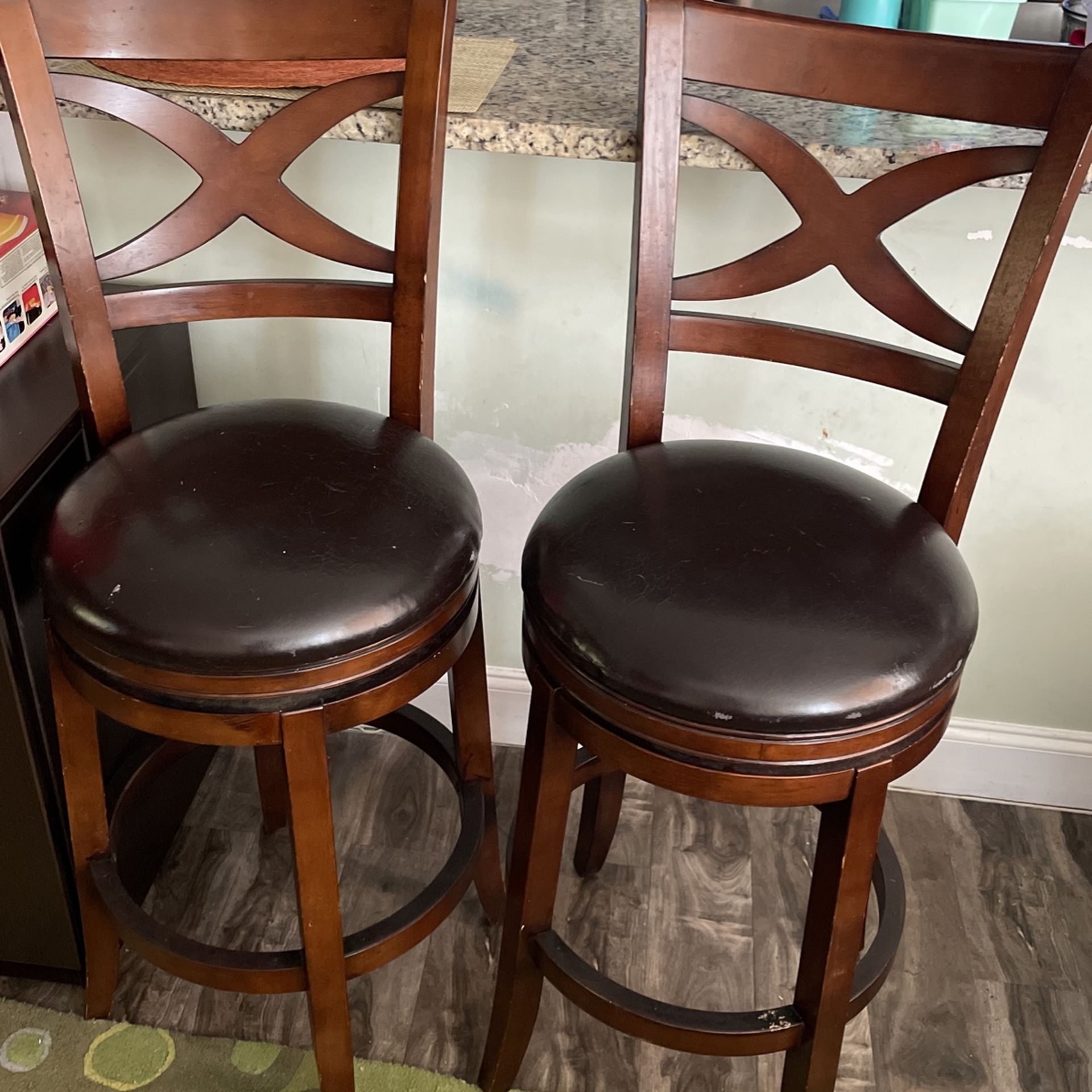 Two Black Seated Leather Bar Stools