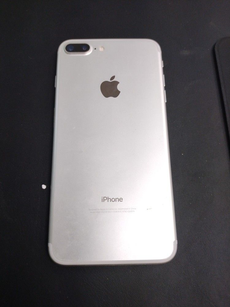 Unlocked 7 pl us clean , warranty included and charger