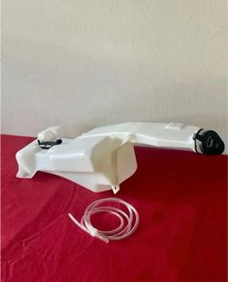 New windshield washer fluid reservoir