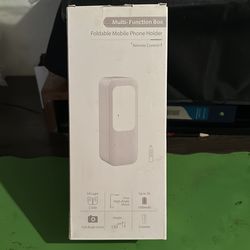 Multifunctional box foldable for mobile phones