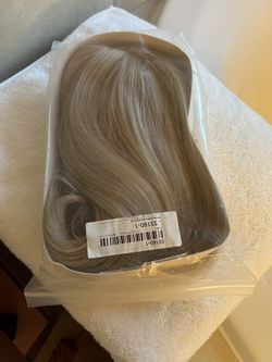 Brand new silky, platinum wig, brand new never used very silky