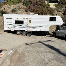 Weekend Warrior 28ft Fifth Wheel Toy Hauler Trailer