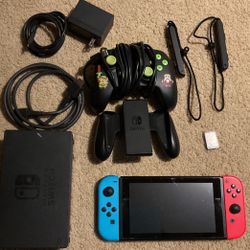 Nintendo Switch Neon Red and Blue, Everything Included + Lets Go Pikachu + Legend of Zelda Wired Controller