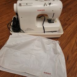 like new singer sewing machine 