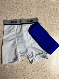 Franklin Compression Shorts with Cup and blue socks.