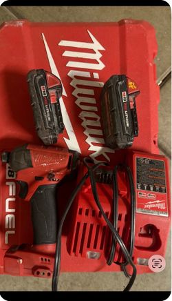 Milwaukee fuel drill ,batteries and charger