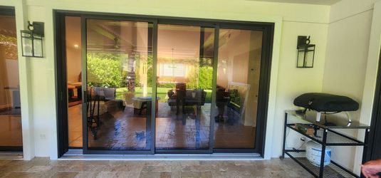 New exterior 3 4 ft panels Hurricane 🌀 bronze with impact glass frame size 141.75 by 95.25 needs assembling
